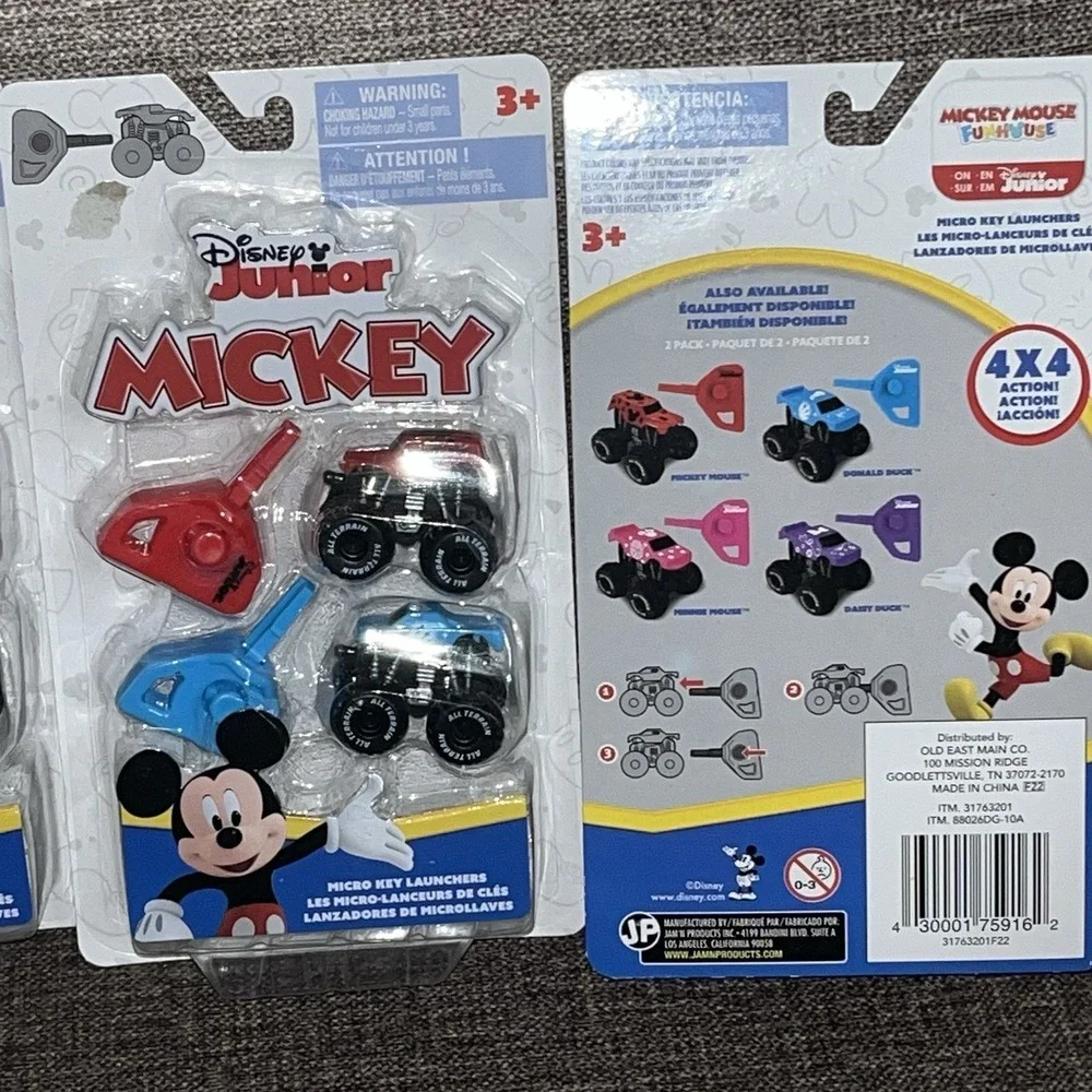 Disney‎ Junior Mickey Mouse Micro key launchers 4 Packs Of 2 Red & Blue Trucks
